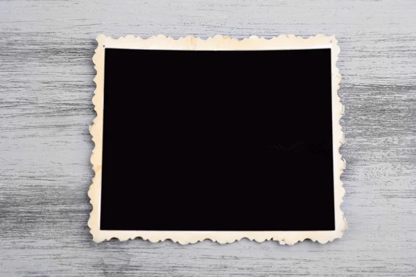 Lege oude foto op een houten achtergrond kleur — Stockfoto