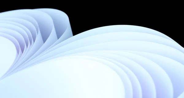 Abstract image of sheets white paper wave shape on black background close-up — Stock Photo, Image