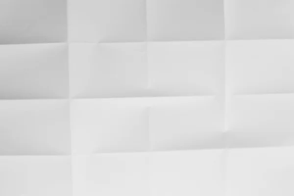 Gefaltetes weißes Blatt Papier in Nahaufnahme — Stockfoto