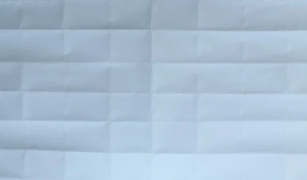 Gevouwen wit vel papier close-up — Stockfoto