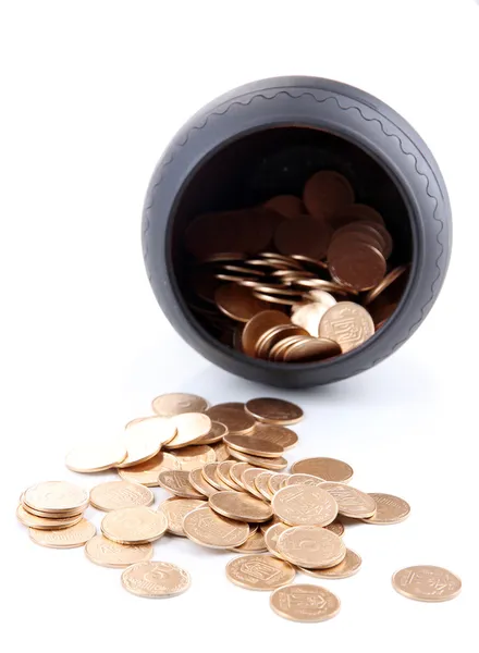 Golden coins falling out from pot, isolated on white background — Stock Photo, Image