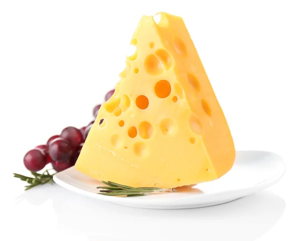 Piece of cheese with grape and rosemary on plate, isolated on white — Stock Photo, Image