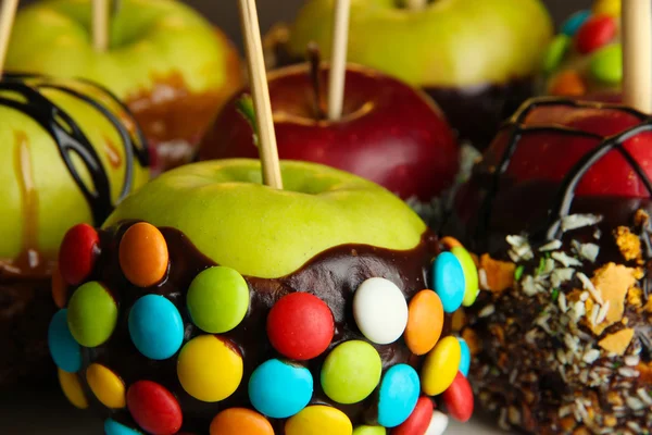 Candied apples on sticks close up — Stock Photo, Image