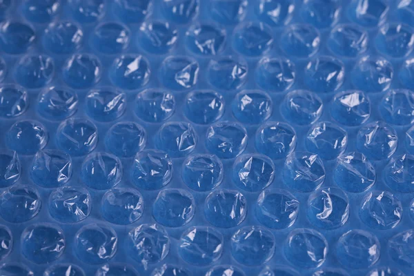 Matériau d'emballage à bulles en plastique couleur, gros plan — Photo