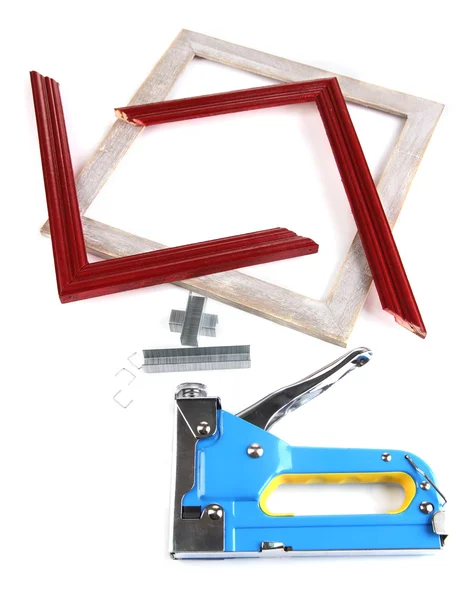 Bouw nietmachine en houten frames geïsoleerd op wit — Stockfoto