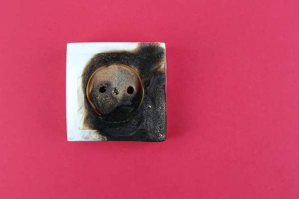 Burned plug socket close up — Stock Photo, Image