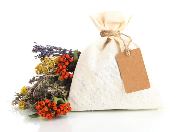 Textile sachet pouch with dried flowers, herbs and berries, isolated on white — Stock Photo, Image