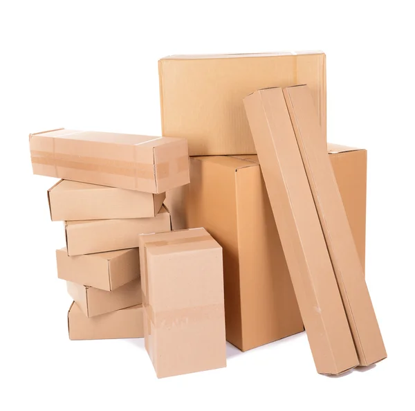 Different cardboard boxes isolated on white — Stock Photo, Image