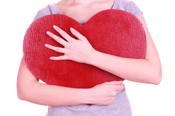 Kvinna håller stort rött hjärta isolerad på vit — Stockfoto