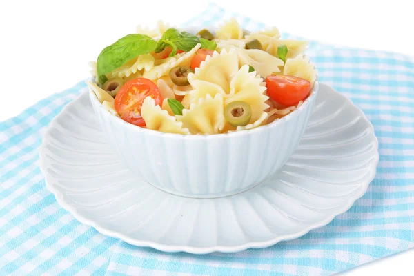 Delicious pasta with tomatoes on plate on table close-up — Stock Photo, Image