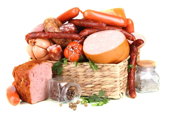 Lot of different sausages in basket isolated on white — Stock Photo, Image