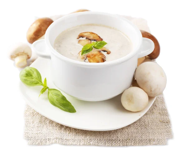 Mushroom soup in white bowl, on napkin, isolated on white — Stock Photo, Image