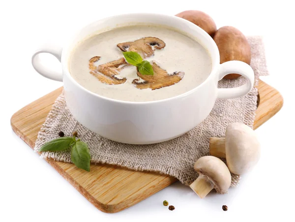 Mushroom soup in white bowl, on napkin, isolated on white — Stock Photo, Image