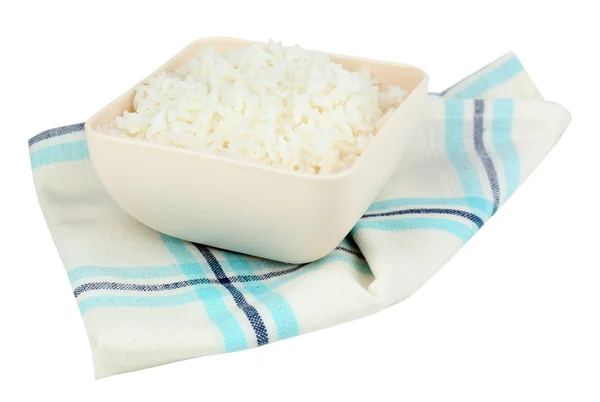 Riz cuit dans un bol sur une serviette isolée sur du blanc — Photo