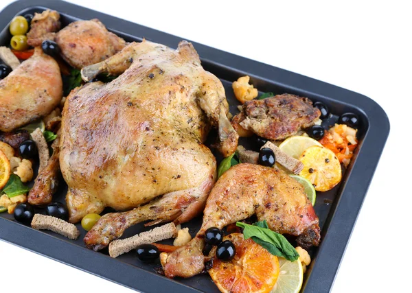 Whole roasted chicken with vegetables on tray, isolated on white — Stock Photo, Image