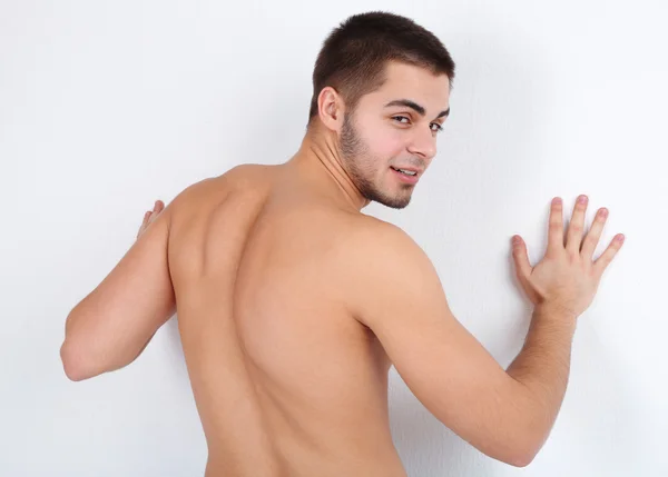 Handsome young man on light background — Stock Photo, Image