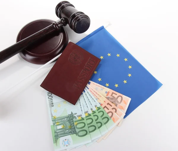 Gavel, money, passport and flag of Europe, isolated on white — Stock Photo, Image