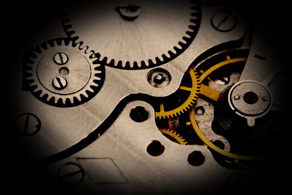 Clockwork details, pinions and wheels closeup