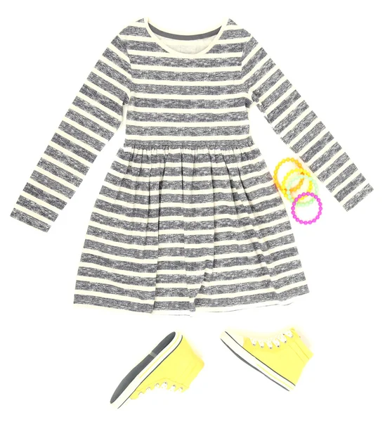 Schönes Kleid und Gummischuhe für kleines Mädchen, isoliert auf weiß — Stockfoto