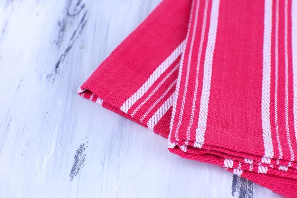 Kitchen towels on wooden background — Stok fotoğraf