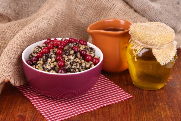 Bowl with kutia -  traditional Christmas sweet meal in Ukraine, Belarus and Poland, on wooden background — Stock Photo, Image