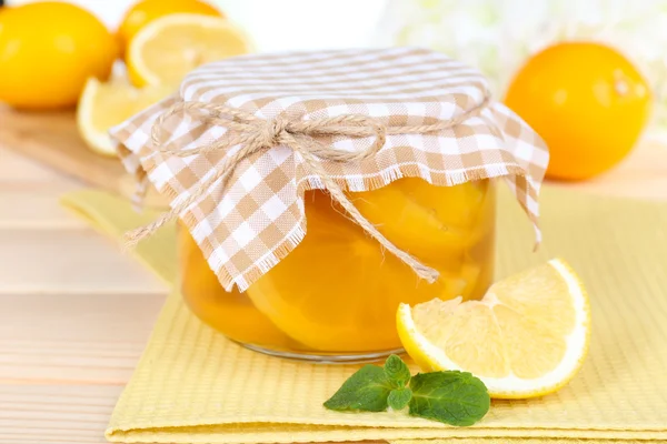 Tasty lemon jam on table close-up — Stock Photo, Image