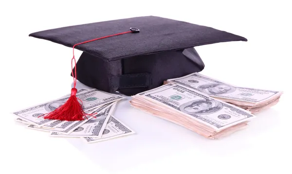 Sombrero de graduación y dinero aislado en blanco — Foto de Stock