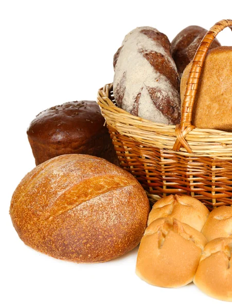 Composition with bread and rolls in wicker basket isolated on white — Stock Photo, Image