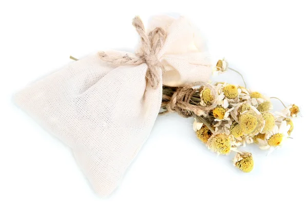 Textile sachet pouch with dried flowers isolated on white — Stock Photo, Image