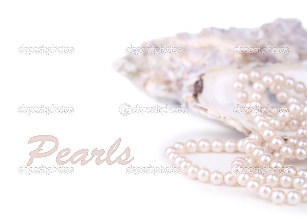 Shell with pearls, isolated on white