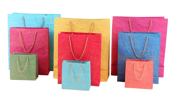 Bolsas de compras coloridas, aisladas en blanco — Foto de Stock