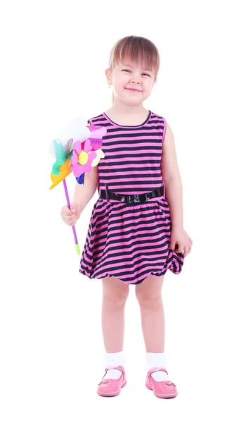 Beautiful little girl holding colorful windmill isolated on white — Stock Photo, Image