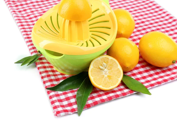 Citrus press and lemons isolated on white — Stock Photo, Image