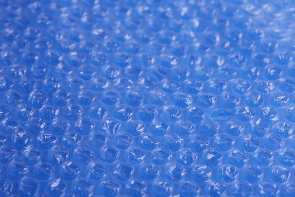 Material plástico del embalaje de la burbuja del color, primer plano — Foto de Stock