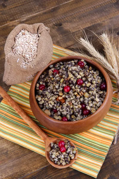 Plate with kutia - traditional Christmas sweet meal in Ukraine, Belarus and Poland, on wooden background — Stock Image Plate with kutia - traditional Christmas sweet meal in Ukraine, Belarus and Poland, on wooden background Royalty Free Stock Images