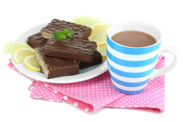 Cup of tea and sweets isolated on white — Stock Photo, Image