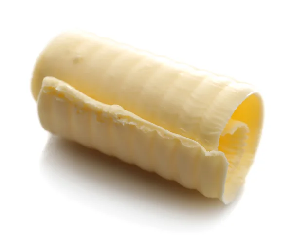 Rotacja świeże masło na białym tle — Zdjęcie stockowe