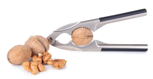 Louskáček s ořechy izolovaných na bílém — Stock fotografie