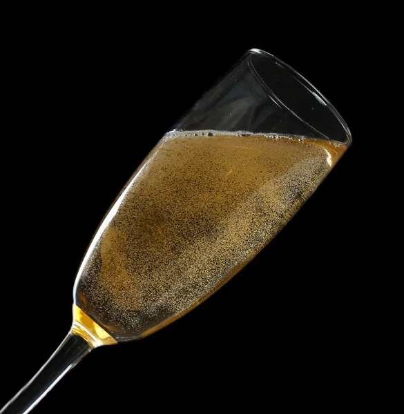 Glass of champagne, on black background — Stock Photo, Image