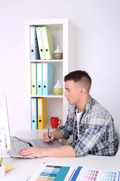 Young creative designer working at office — Stock Photo, Image