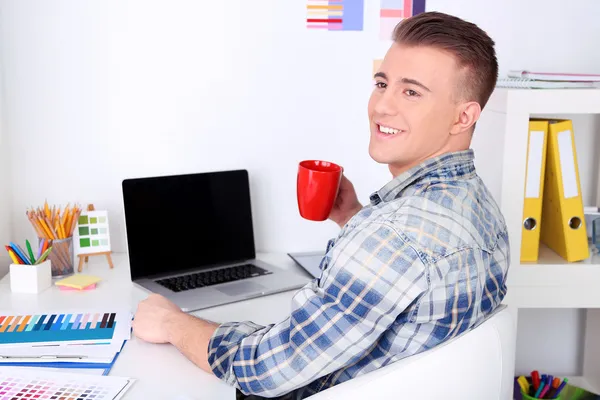 Young creative designer working at office — Stock Photo, Image