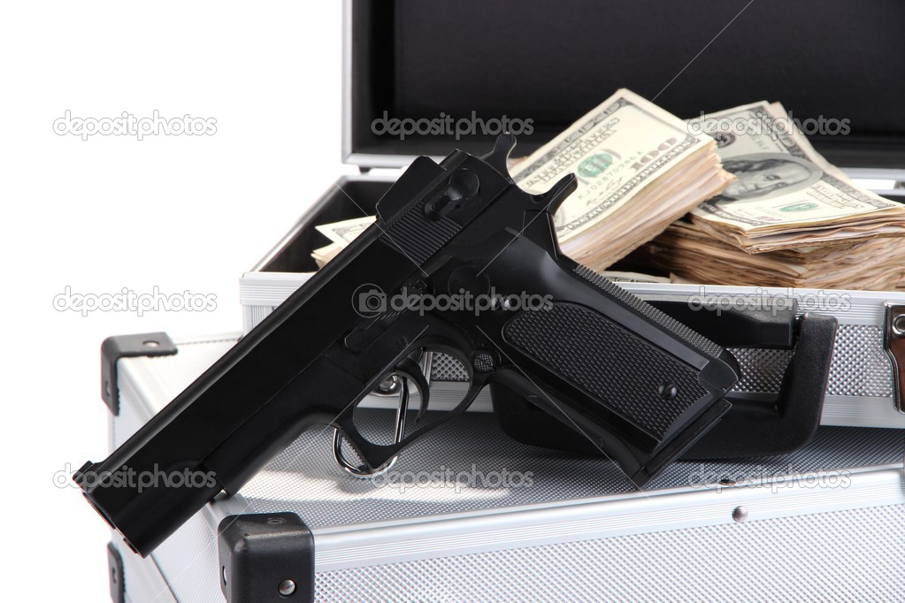 Cases with money and guns, isolated on white