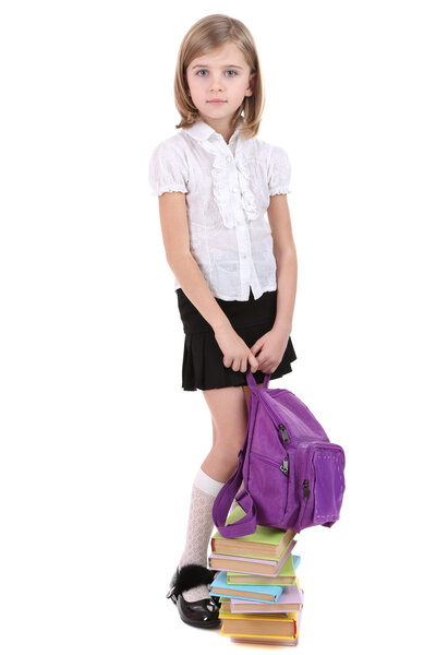 Beautiful little girl holding backpack isolated on white