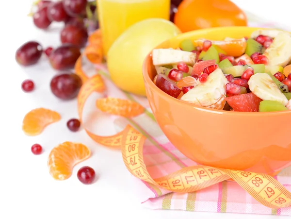 Sweet fresh fruits in bowl on table close-up — Stock Photo, Image