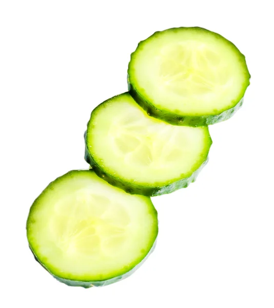 Sliced fresh cucumber, isolated on white — Stock Photo, Image