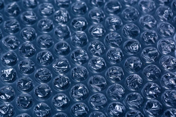 Färg plast bubbla förpackningsmaterial, närbild — Stock fotografie