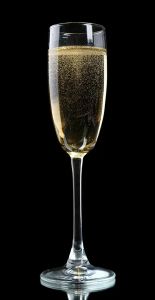 Glas champagne, op zwarte achtergrond — Stockfoto