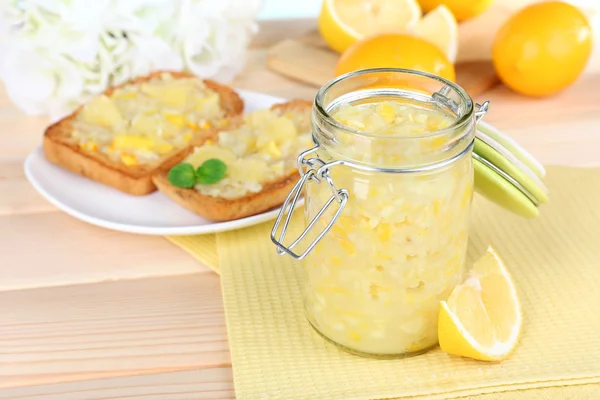 Tasty lemon jam on table close-up — Stock Photo, Image