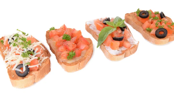 Delicious bruschetta with tomatoes isolated on white — Stock Photo, Image