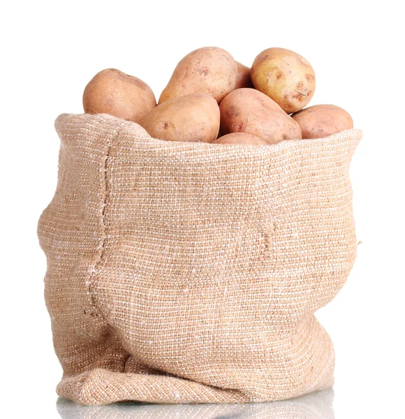 Pommes de terre fraîches dans le sac isolé sur blanc — Photo